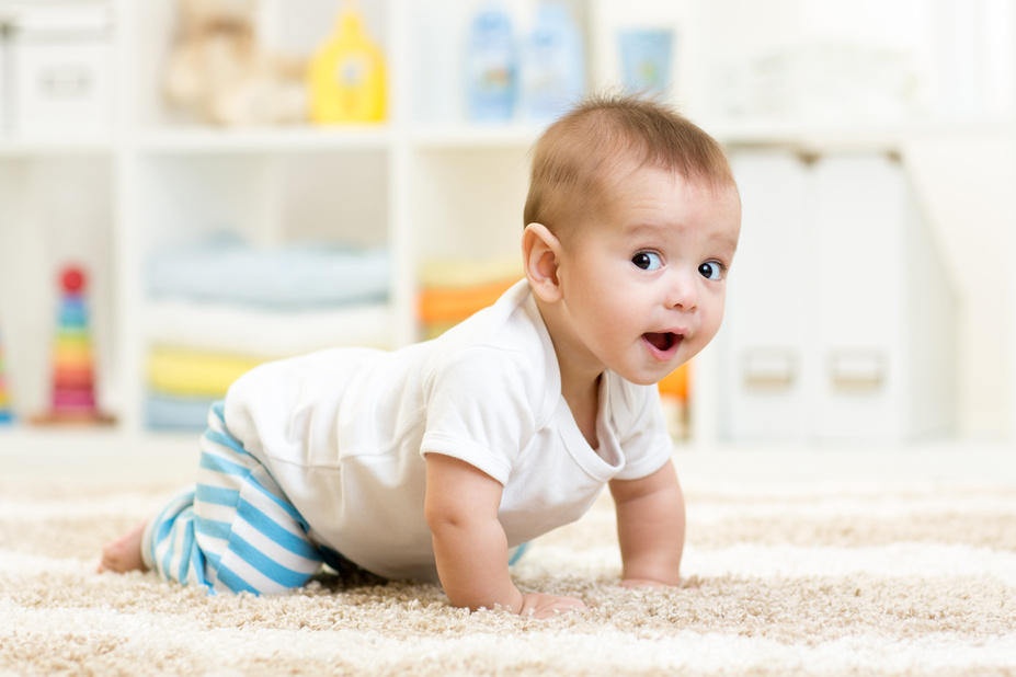 crawling baby boy indoors